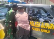 TNI-Polri Sigap Tolongi Wanita Paruh Baya Tergeletak di Pinggir Jalan Raya Buduran Sidoarjo.